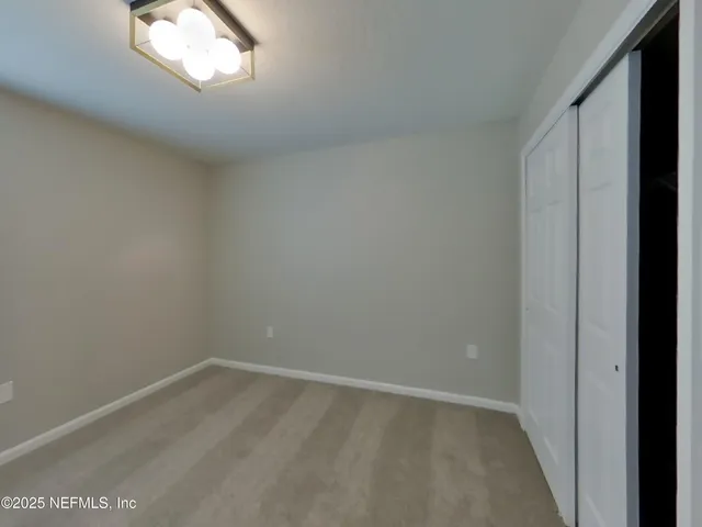 a view of a window in an empty room