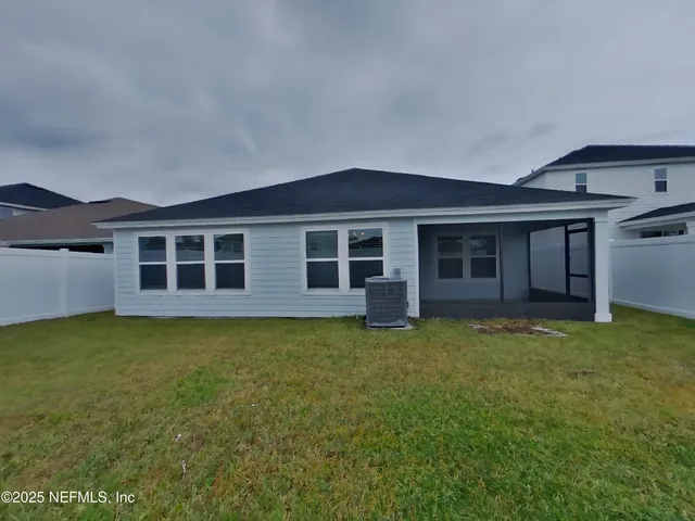 a view of a house with a garden