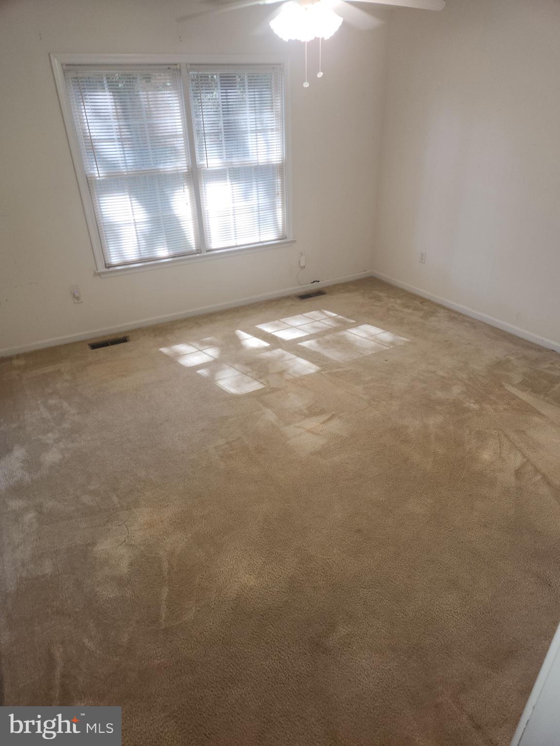 30471 Manor Drive Princess Anne, MD 21853 - Photo 17 of 23 an empty room with a window