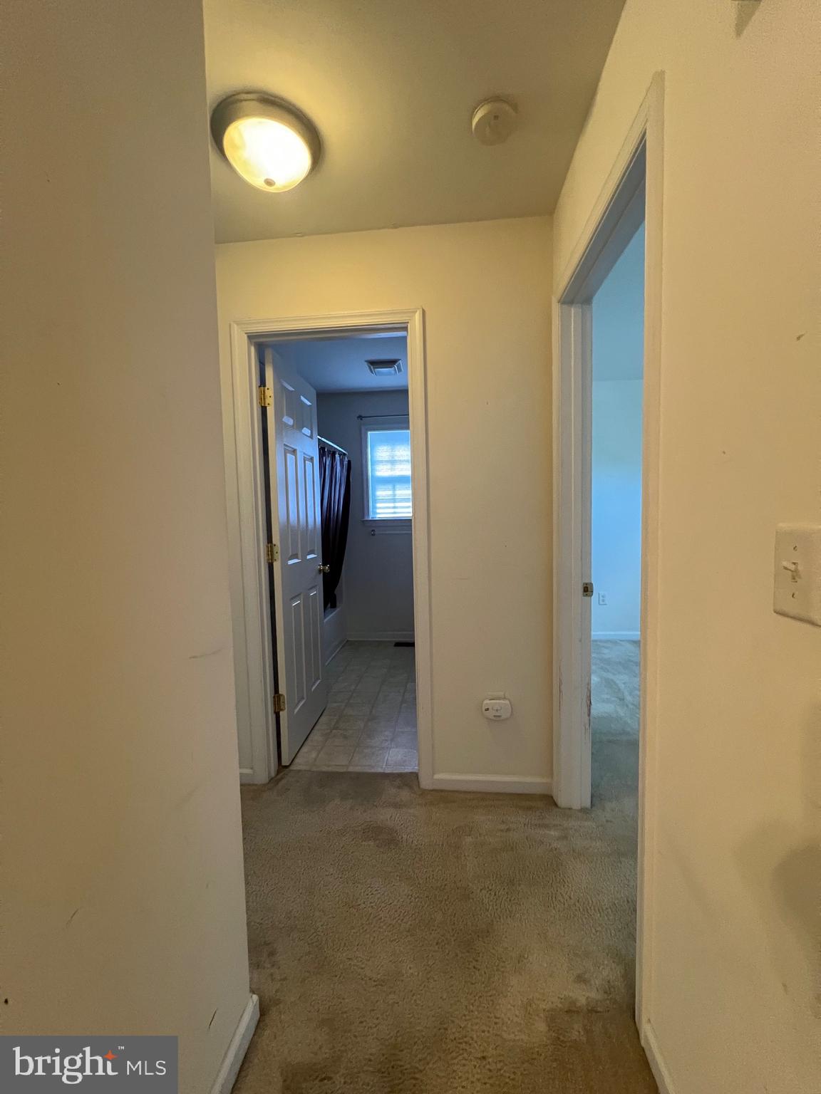 30471 Manor Drive Princess Anne, MD 21853 - Photo 19 of 23 a view of a hallway with wooden floor