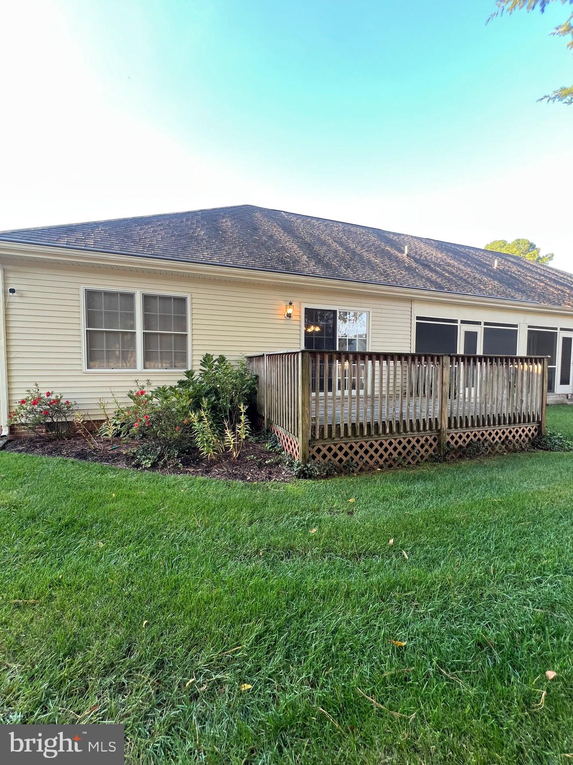 30471 Manor Drive Princess Anne, MD 21853 - Photo 3 of 23 a view of a house with a yard and deck