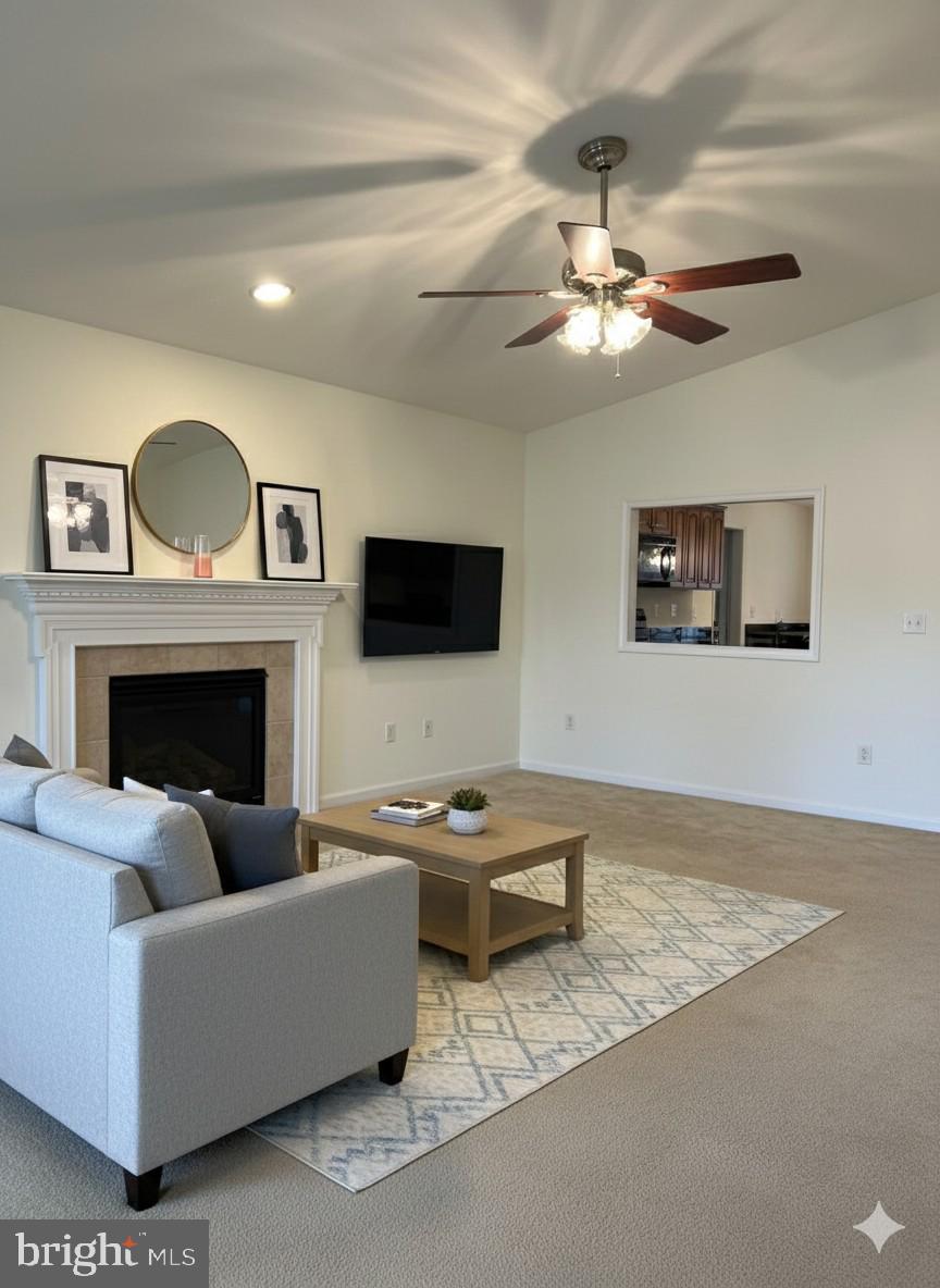 30471 Manor Drive Princess Anne, MD 21853 - Photo 6 of 23 a living room with furniture and a fireplace