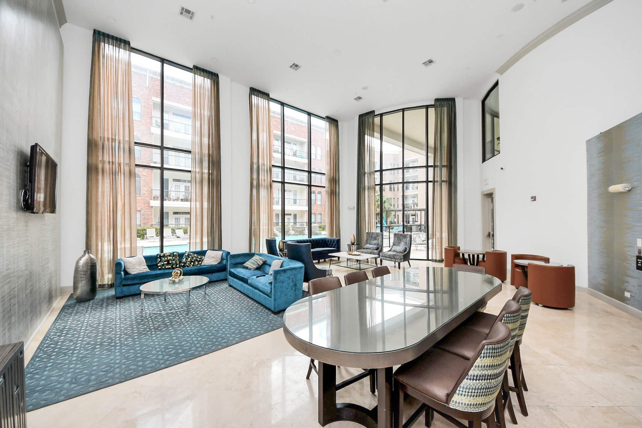 6363 San Felipe Street, Unit 549 Houston, TX 77057 - Photo 41 of 43 a dining table with chairs and window