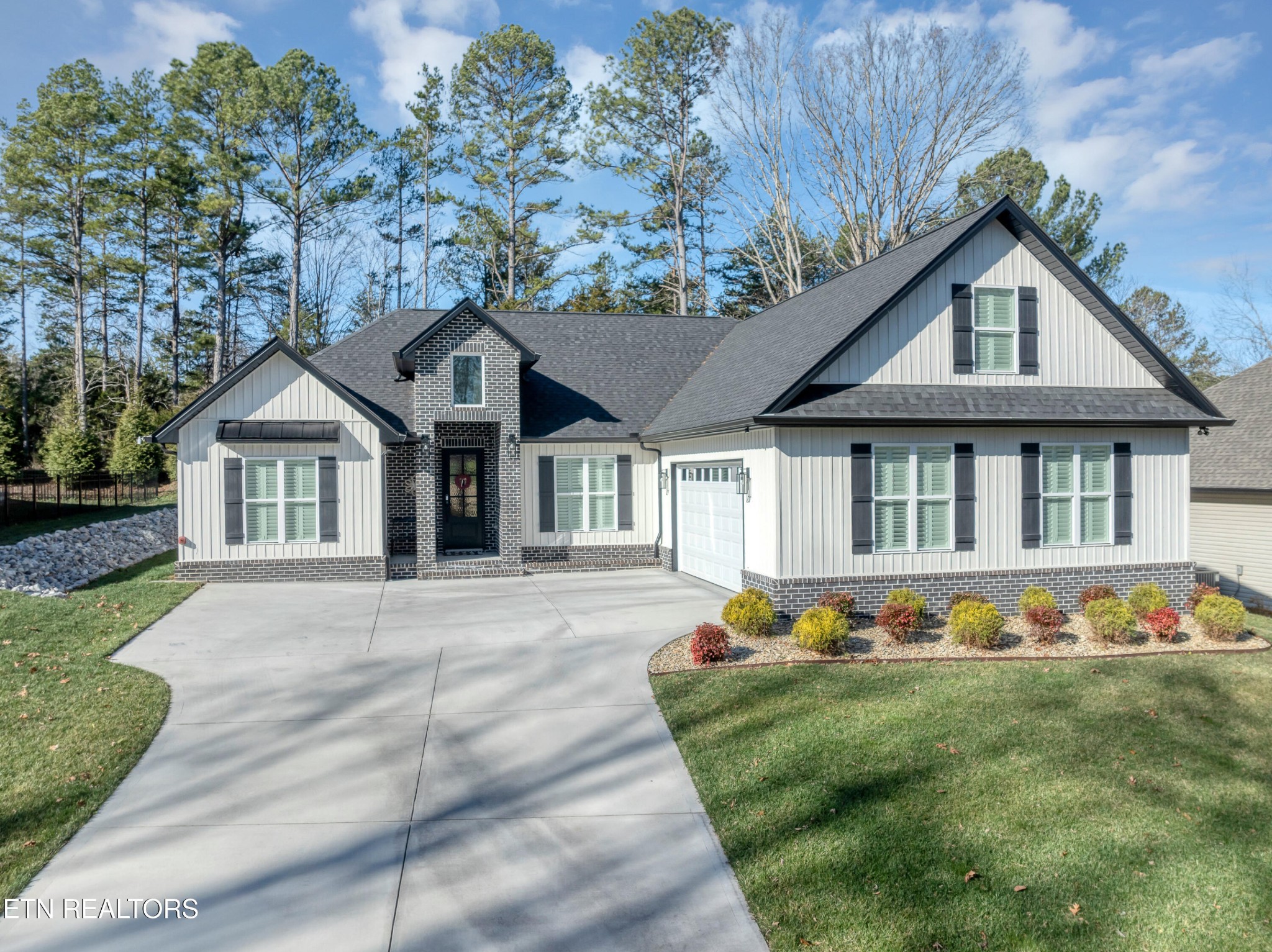 374 Mingo Way Loudon, TN 37774 - Photo 1 of 51 a front view of a house with garden