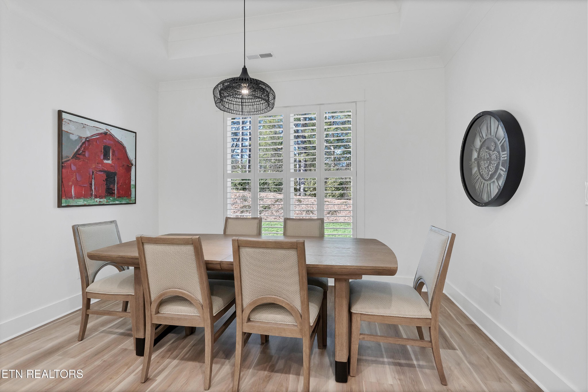 374 Mingo Way Loudon, TN 37774 - Photo 12 of 51 a view of a dining room with furniture window and wooden floor