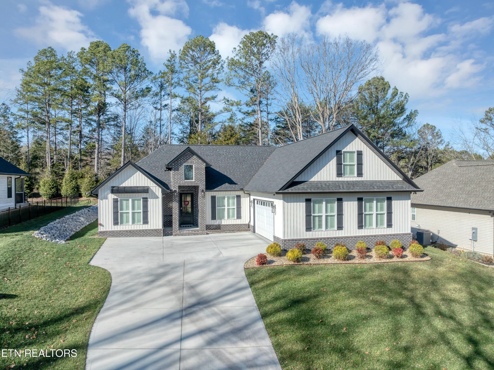 374 Mingo Way Loudon, TN 37774 - Photo 2 of 51 front view of a house with a yard