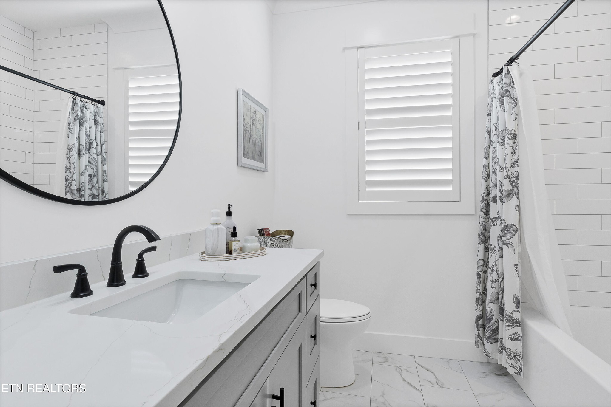 374 Mingo Way Loudon, TN 37774 - Photo 28 of 51 a bathroom with a sink and a mirror