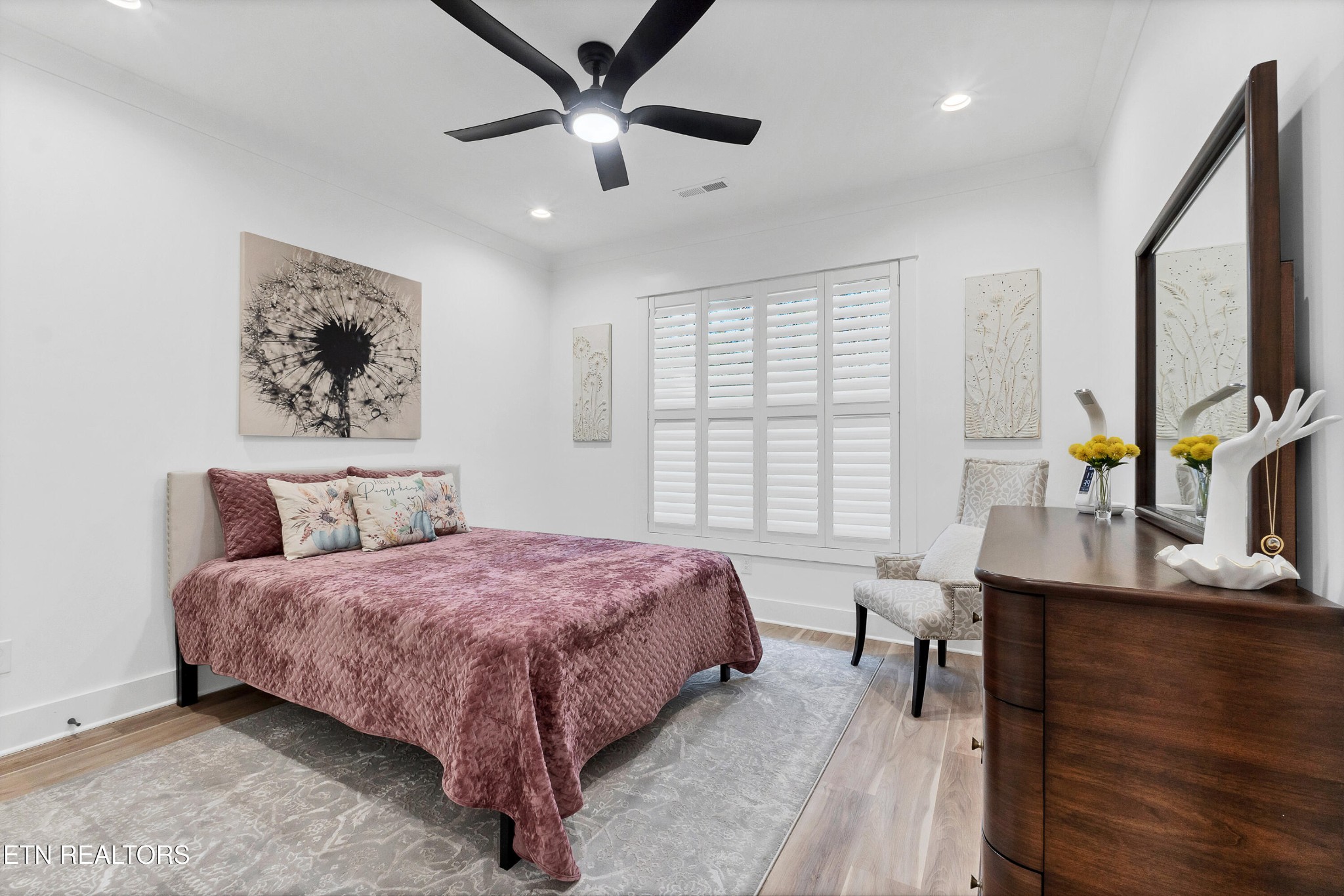 374 Mingo Way Loudon, TN 37774 - Photo 30 of 51 a spacious bedroom with a bed a dresser and a large window