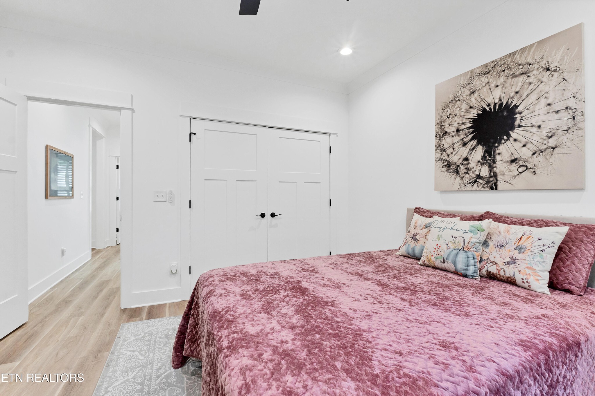 374 Mingo Way Loudon, TN 37774 - Photo 31 of 51 a bedroom with a bed and a painting on the wall