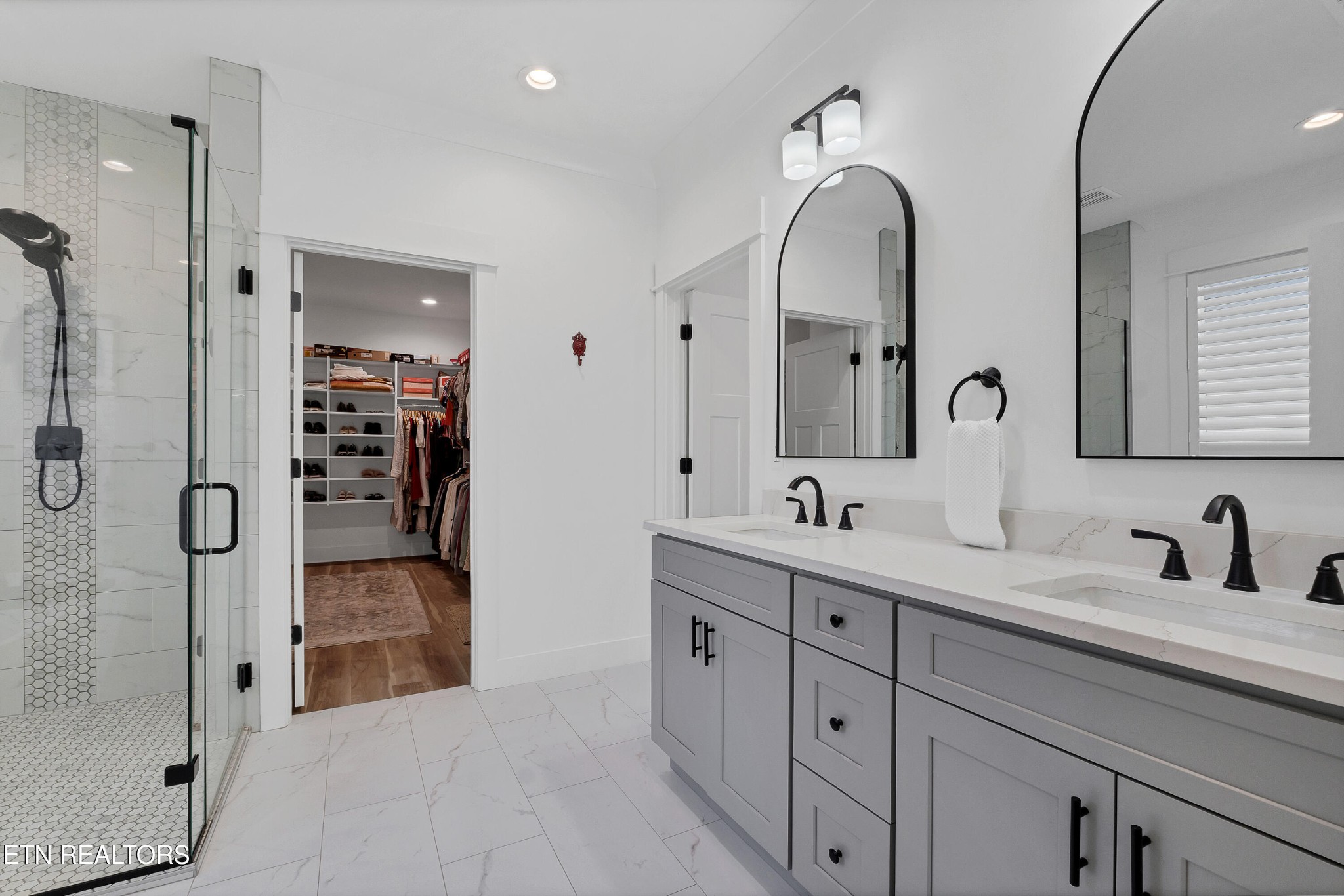374 Mingo Way Loudon, TN 37774 - Photo 35 of 51 a bathroom with double vanity sinks and a shower