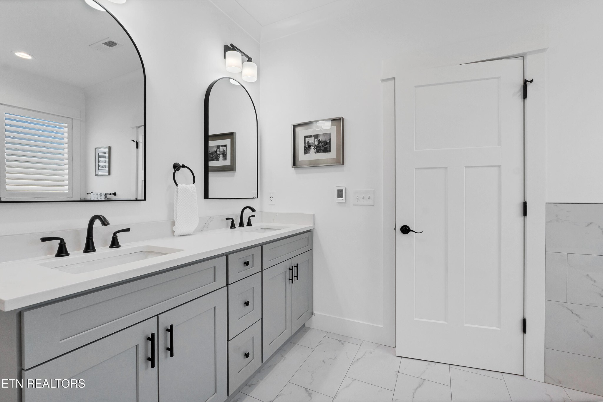 374 Mingo Way Loudon, TN 37774 - Photo 39 of 51 a bathroom with a double vanity sink and mirror