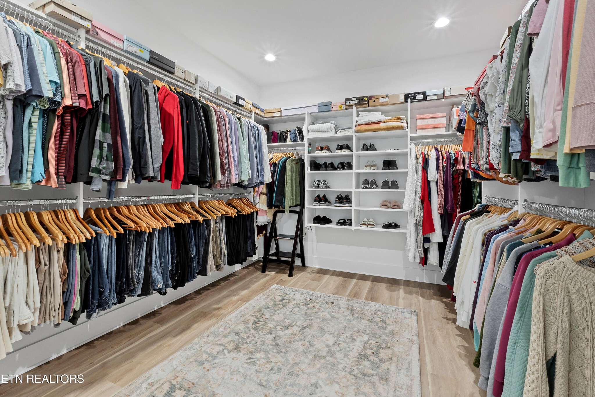 374 Mingo Way Loudon, TN 37774 - Photo 40 of 51 a view of walk in closet with clothes and shoes
