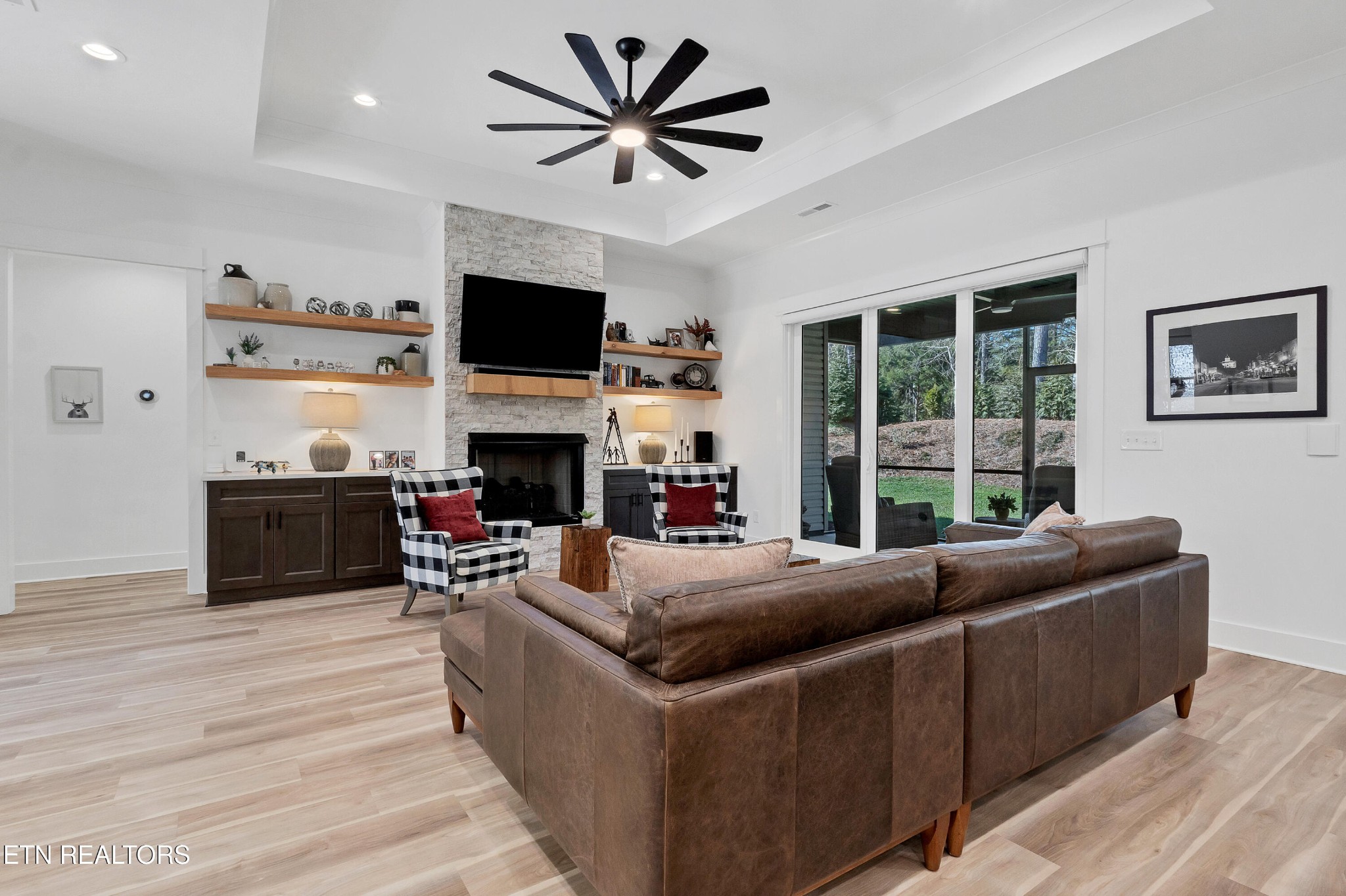 374 Mingo Way Loudon, TN 37774 - Photo 6 of 51 a living room with fireplace furniture and a flat screen tv