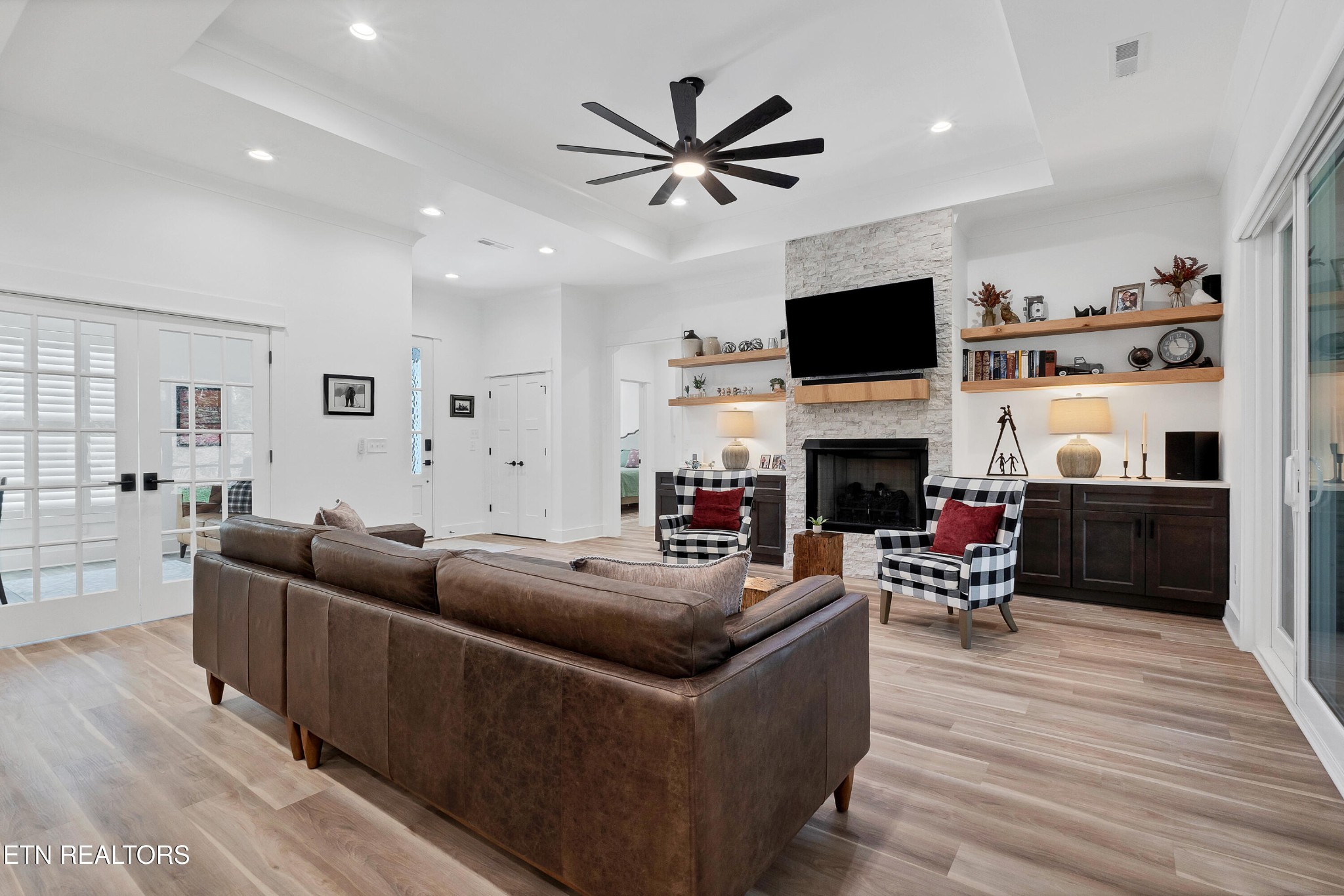 374 Mingo Way Loudon, TN 37774 - Photo 7 of 51 a living room with furniture fireplace and a flat screen tv