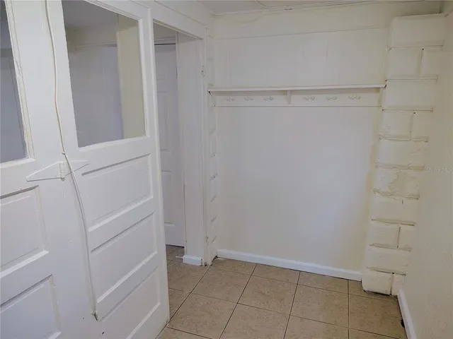 a view of an empty walk in closet