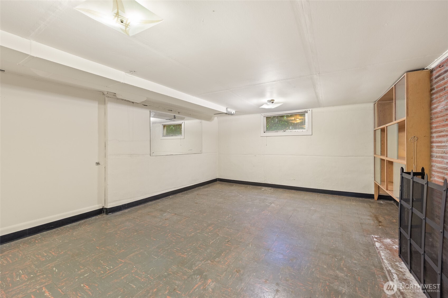 9619 Southwest 268th Street Vashon, WA 98070 - Photo 27 of 37 an empty room with windows & entryway