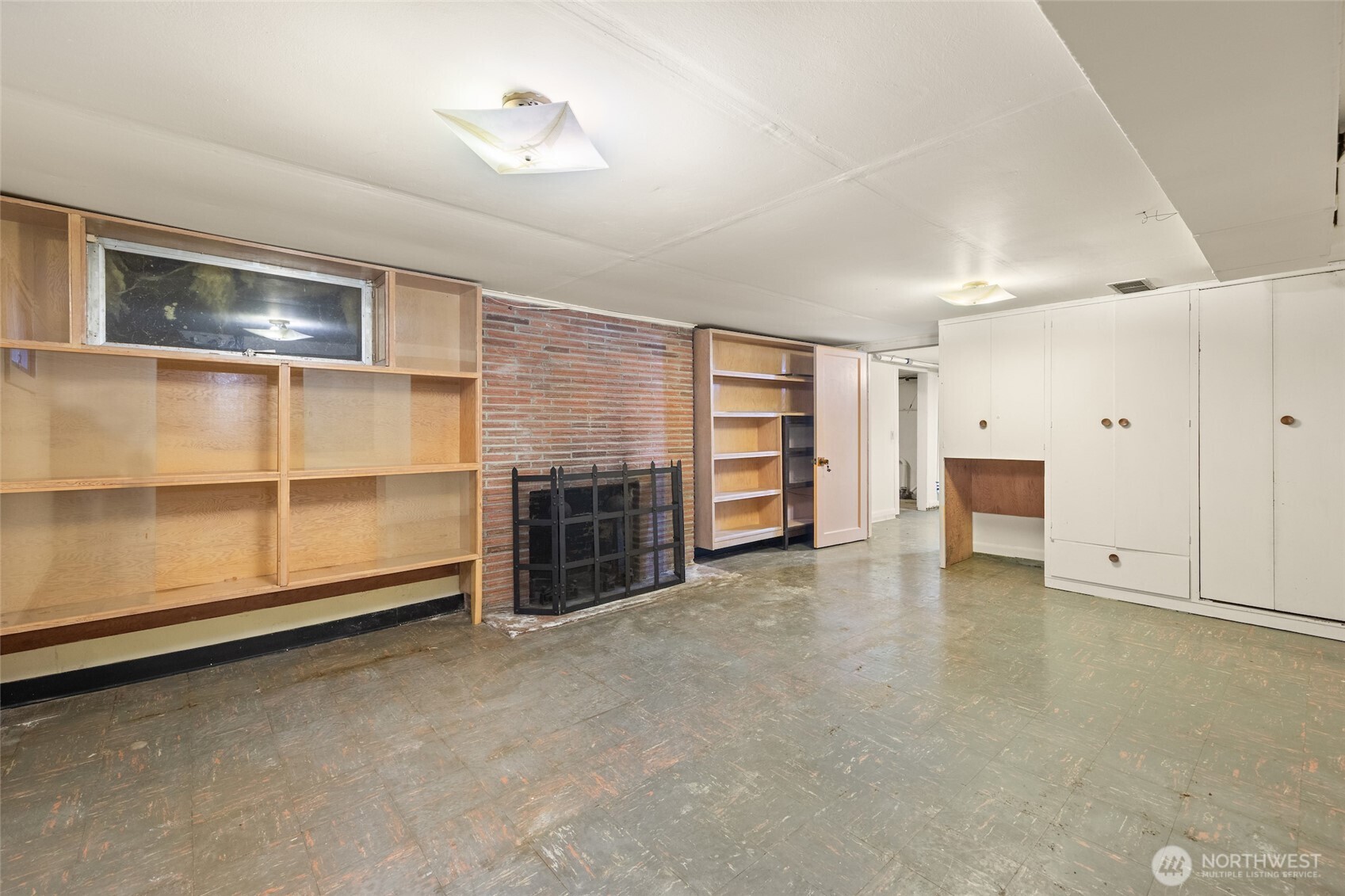 9619 Southwest 268th Street Vashon, WA 98070 - Photo 28 of 37 a view of an empty room with a fireplace