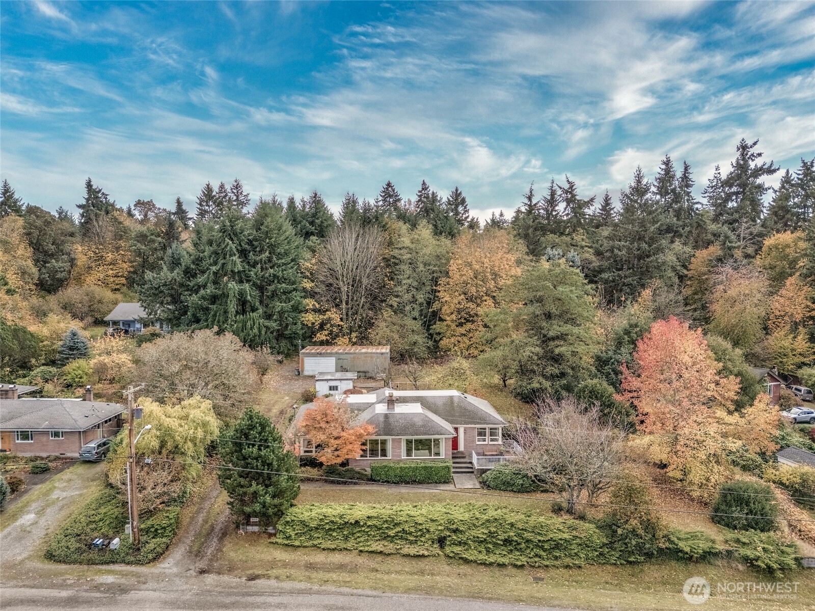 9619 Southwest 268th Street Vashon, WA 98070 - Photo 3 of 37 a view of a city with lots of trees