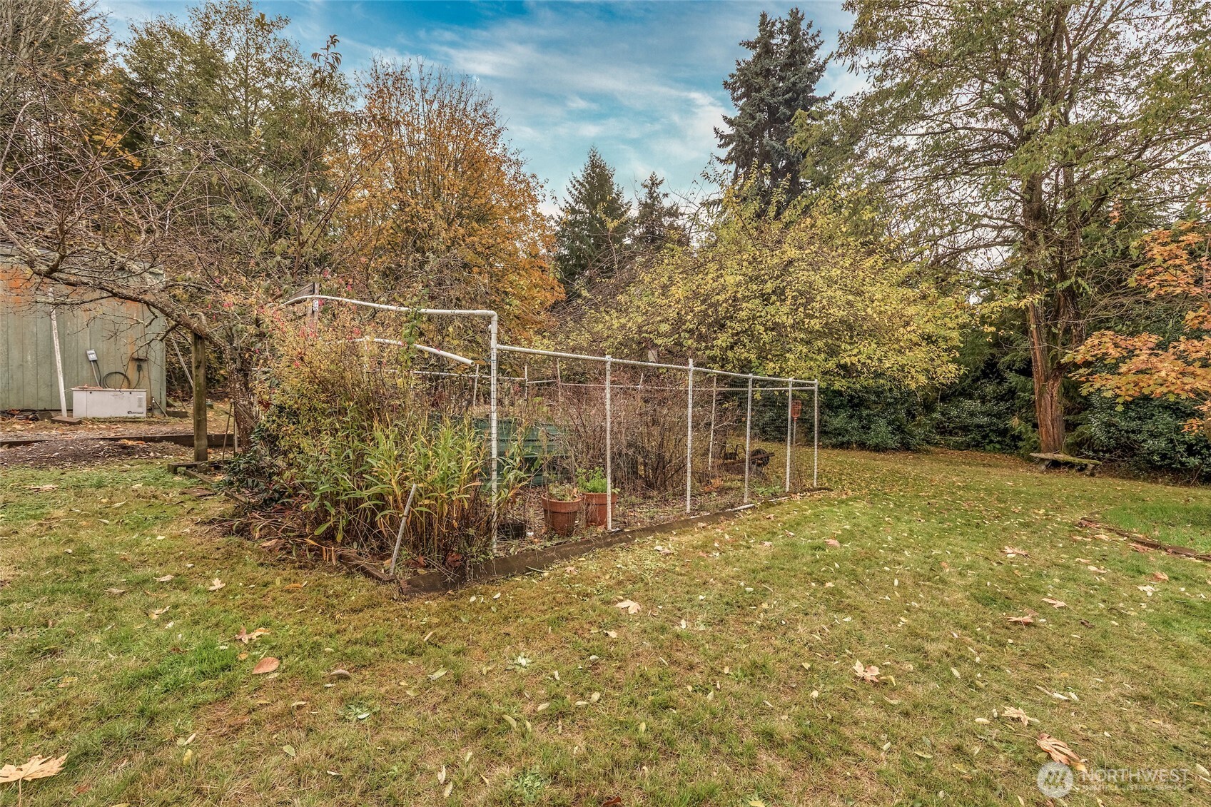 9619 Southwest 268th Street Vashon, WA 98070 - Photo 34 of 37 a view of a yard with large trees