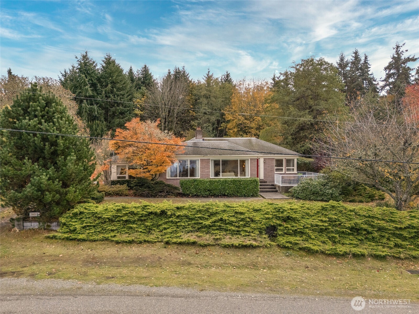 9619 Southwest 268th Street Vashon, WA 98070 - Photo 37 of 37 a front view of a house with a yard