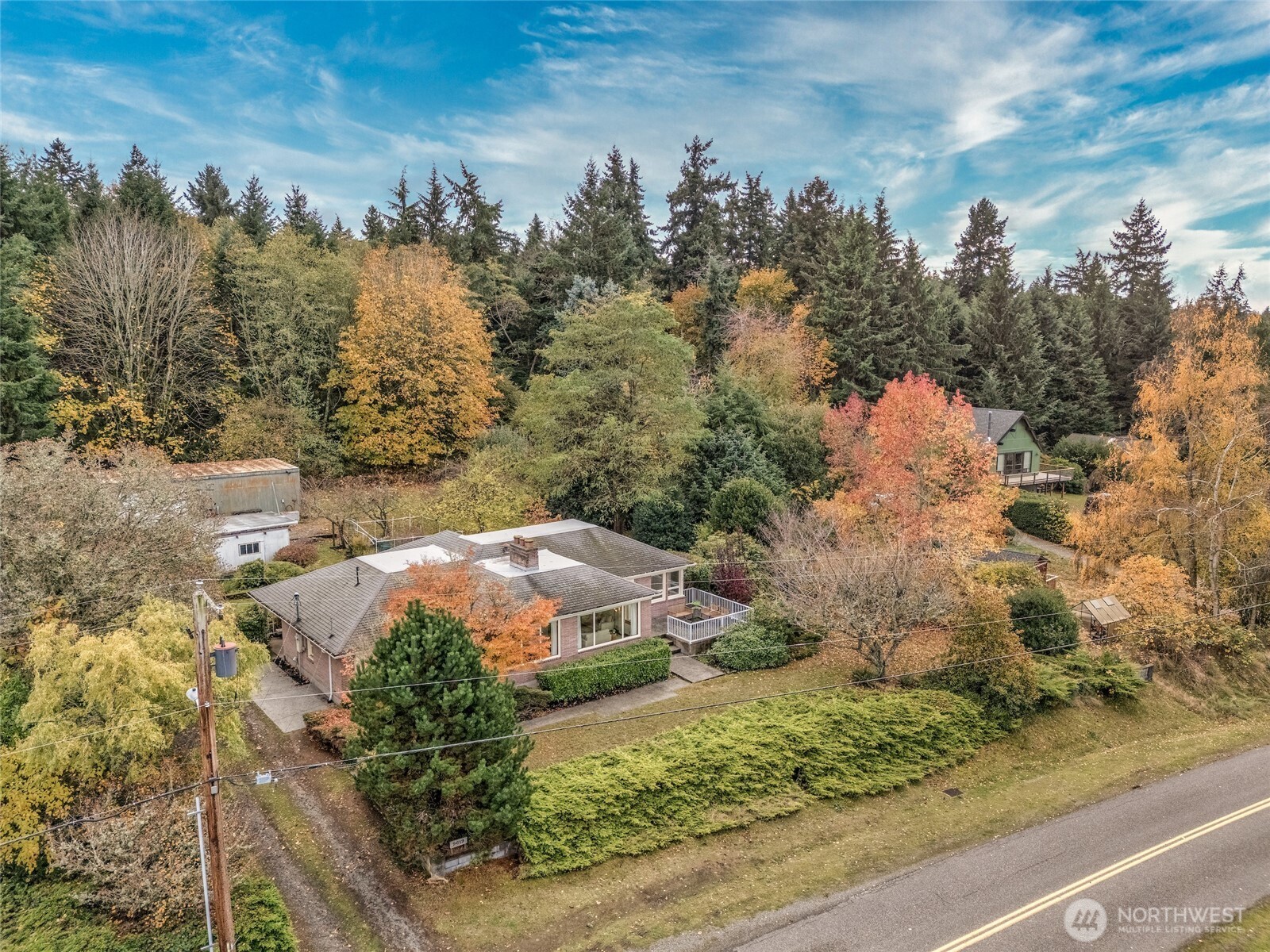 9619 Southwest 268th Street Vashon, WA 98070 - Photo 6 of 37 a view of a yard with an trees