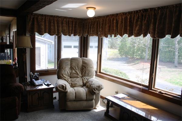 254 Plumtree Road Sunderland, MA 01375 - Photo 8 of 15 a living room with furniture and a large window