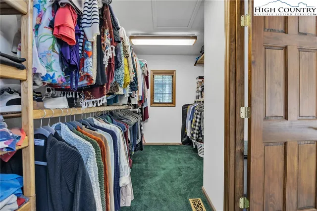a bathroom with a sink and a large mirror