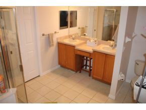 2513 Southern Melbourne, FL 32901 - Photo 12 of 12 a bathroom with a sink and a mirror