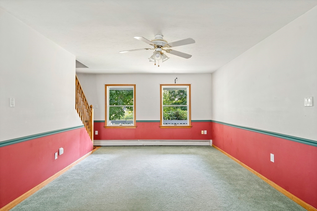 36 Depot Road Hatfield, MA 01038 - Photo 15 of 39 wooden floor with a window and a chandelier fan