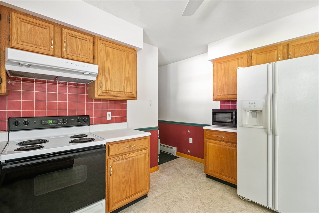 36 Depot Road Hatfield, MA 01038 - Photo 19 of 39 a kitchen with stainless steel appliances a stove sink and cabinets