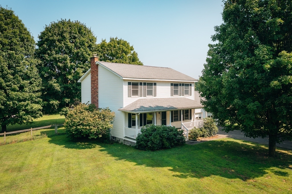 36 Depot Road Hatfield, MA 01038 - Photo 2 of 39 a front view of a house with a yard