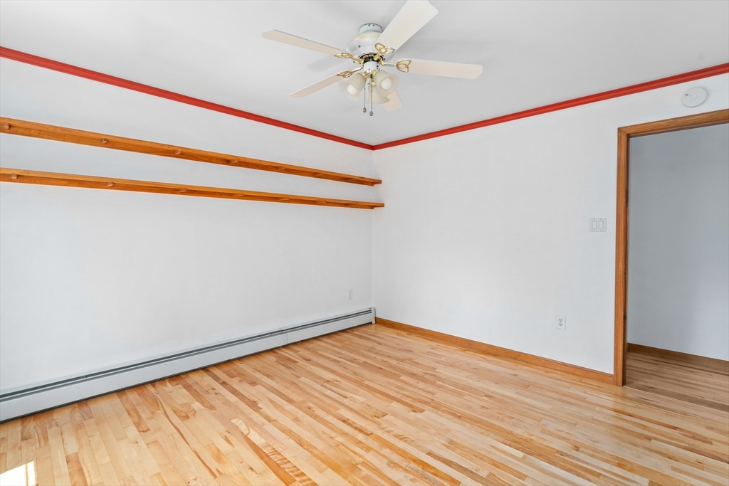 36 Depot Road Hatfield, MA 01038 - Photo 28 of 39 a view of a room with wooden floor and a ceiling fan