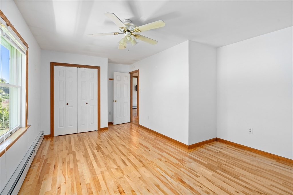 36 Depot Road Hatfield, MA 01038 - Photo 30 of 39 a view of a room with wooden floor and fan