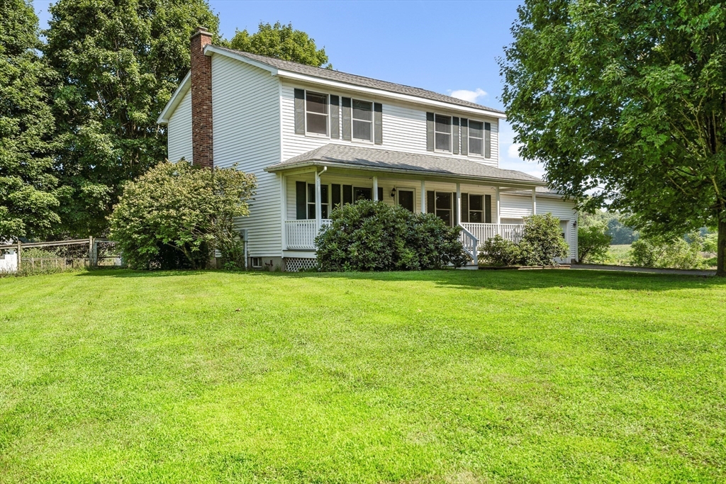 36 Depot Road Hatfield, MA 01038 - Photo 3 of 39 a front view of a house with a yard