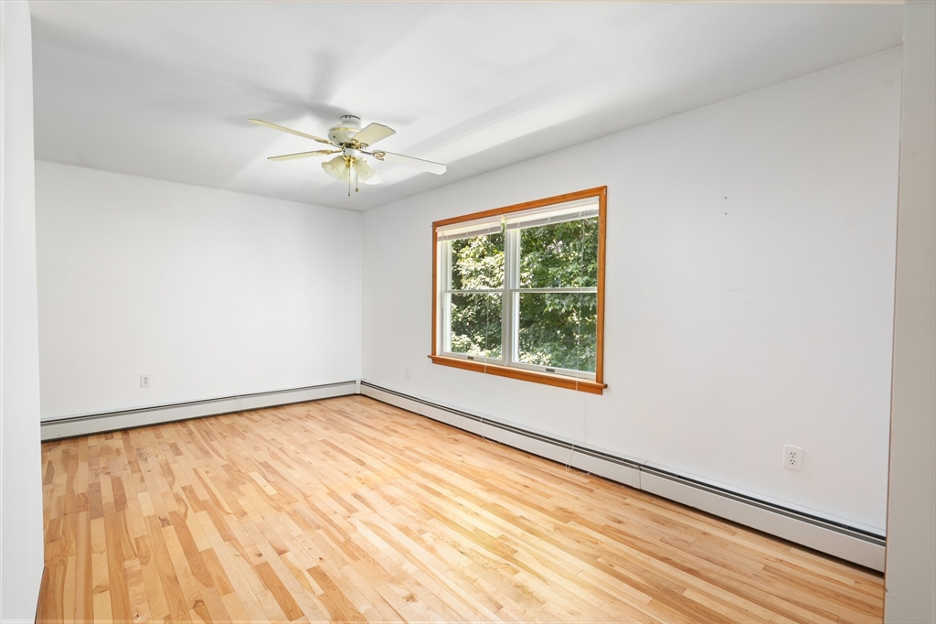 36 Depot Road Hatfield, MA 01038 - Photo 31 of 39 an empty room with windows and fan