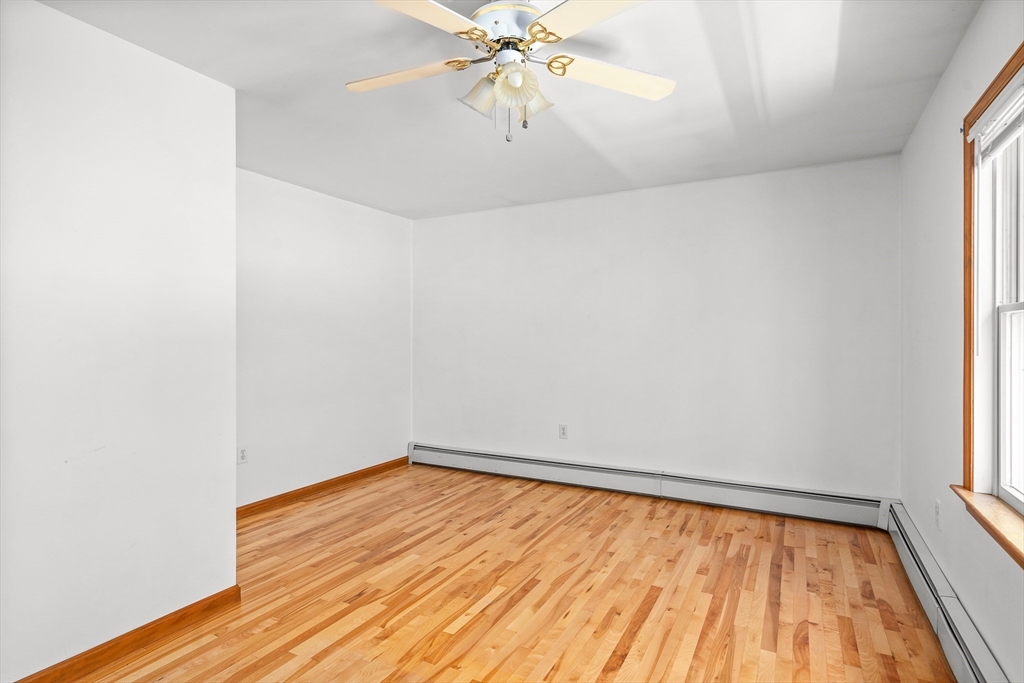 36 Depot Road Hatfield, MA 01038 - Photo 32 of 39 wooden floor in an empty room with a window