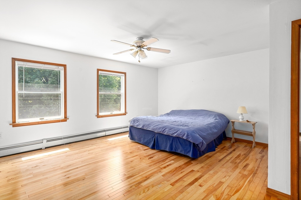 36 Depot Road Hatfield, MA 01038 - Photo 35 of 39 a spacious bedroom with a bed and two windows