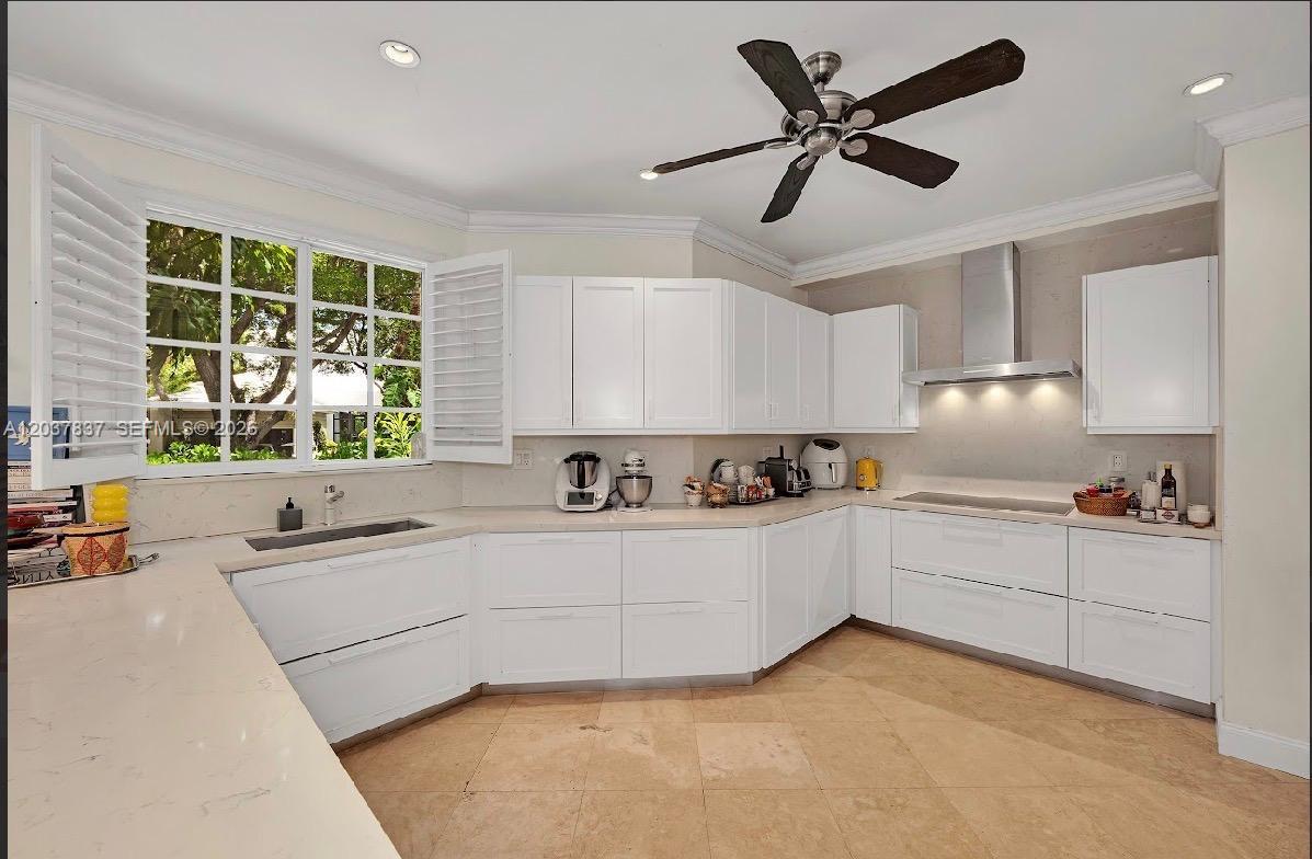 797 Glenridge Road Key Biscayne, FL 33149 - Photo 14 of 39 a kitchen with a stove a refrigerator and a sink