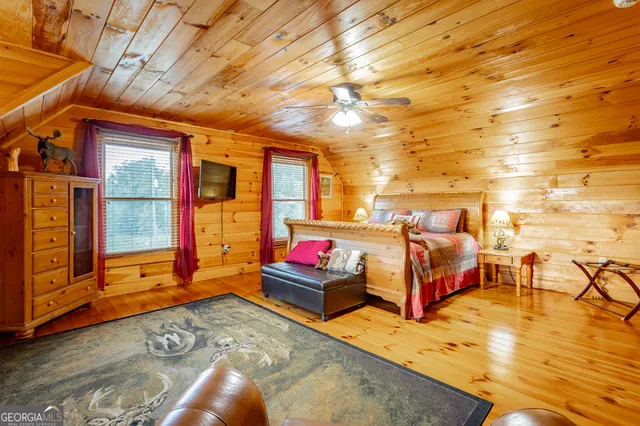 a view of a porch with wooden floor