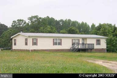 13998 Ridge Road King George, VA 22485 - Photo 1 of 1 a view of a house with a yard