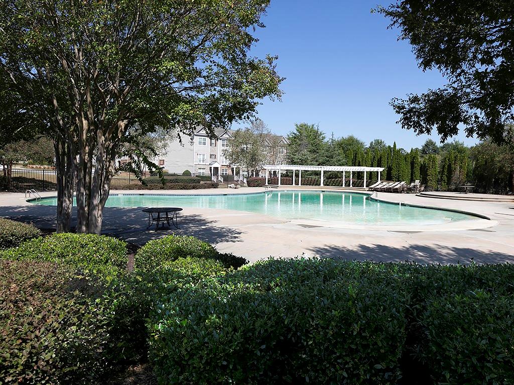 7699 Bucknell Terrace Fairburn, GA 30213 - Photo 30 of 34 a view of a lake with houses in outdoor space