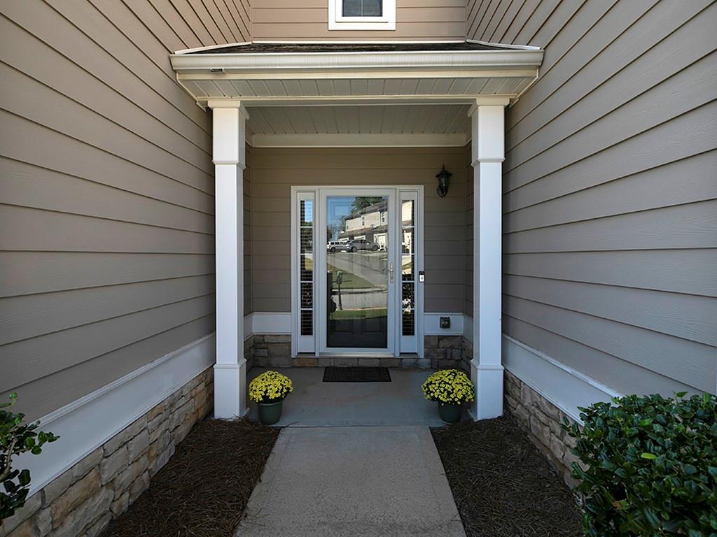 7699 Bucknell Terrace Fairburn, GA 30213 - Photo 3 of 34 a view of sitting area in front of house