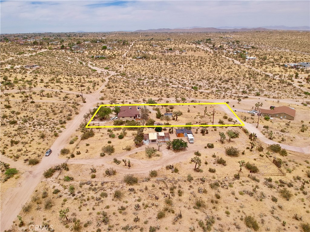 5407 Paradise View Road Yucca Valley, CA 92284 - Photo 62 of 63 an aerial view of residential houses with outdoor space