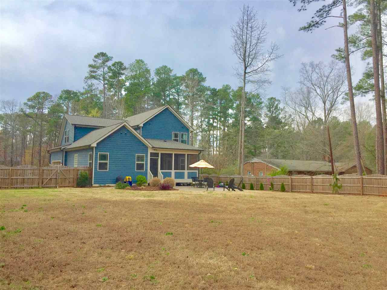 1308 Trinity Circle Raleigh, NC 27607 - Photo 24 of 25 Wow! What an amazing backyard! Fenced in, stamped patio, landscaped, walks right in to screened porch! Backyard Back Ext