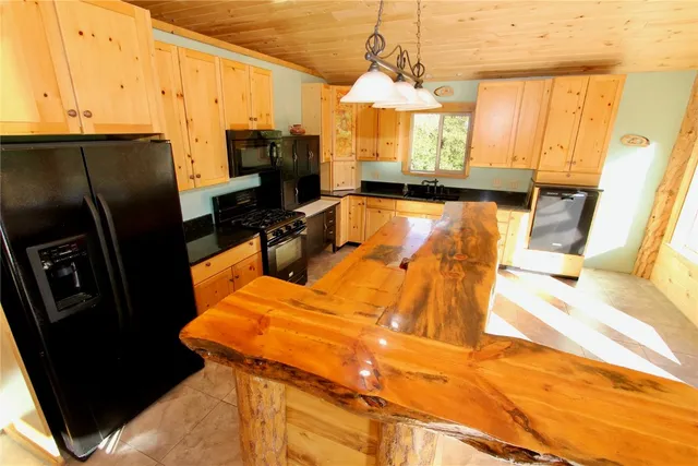 a view of a living room with furniture