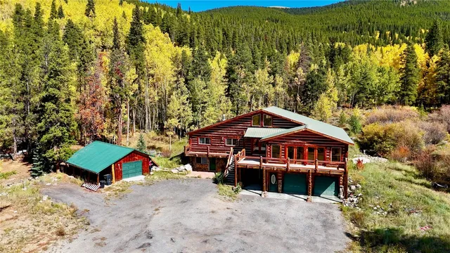 an outdoor space with swimming pool and furniture