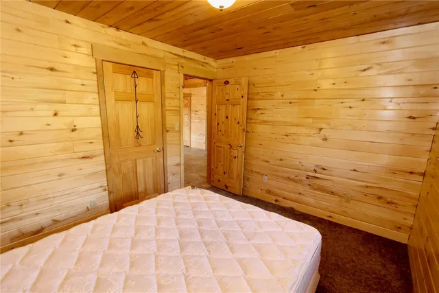 a bedroom with a bed