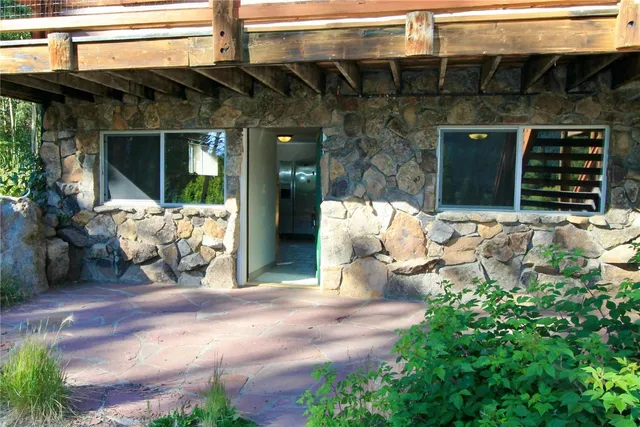 a kitchen with stainless steel appliances a refrigerator sink and cabinets