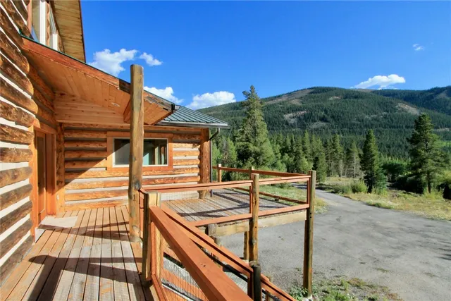 a view of a house with pool and porch