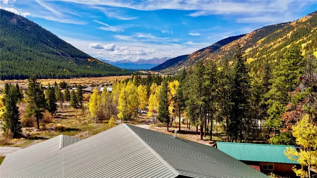 a view of swimming pool with an outdoor seating